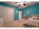 Bright bedroom features a ceiling fan, closet, and comfortable bed at 447 Navona Dr, Summerville, SC 29486