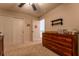Bedroom with wood dresser, closet, and neutral carpet at 447 Navona Dr, Summerville, SC 29486