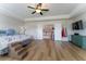 Bright primary bedroom with hardwood floors featuring multiple doorways at 447 Navona Dr, Summerville, SC 29486