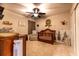 Bedroom with wood crib, mounted fan, and neutral carpet at 447 Navona Dr, Summerville, SC 29486