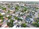 An aerial view of a dense suburban neighborhood featuring colorful rooftops and tree-lined streets at 48 Aiken St, Charleston, SC 29403