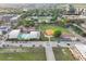 Overhead view featuring community amenities including pool, ball field, and tennis courts near residential buildings at 48 Aiken St, Charleston, SC 29403