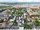 Scenic aerial view of charming Charleston homes with industrial harbor backdrop and bridges at 48 Aiken St, Charleston, SC 29403