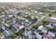 This high-angle neighborhood view includes a mix of home styles, streets, and verdant trees at 48 Aiken St, Charleston, SC 29403