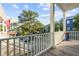 Relaxing balcony view with railing overlooking parking area and neighborhood at 48 Aiken St, Charleston, SC 29403