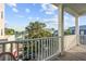 Balcony view overlooking the neighborhood from a home with white railings at 48 Aiken St, Charleston, SC 29403