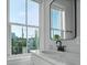 Bathroom features modern vanity, neutral color palette, and natural light at 48 Aiken St, Charleston, SC 29403