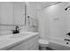 Clean bathroom features a modern vanity, patterned tile, and a shower/tub combo at 48 Aiken St, Charleston, SC 29403