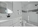 Sleek bathroom with modern vanity, walk-in shower, and custom patterned tile at 48 Aiken St, Charleston, SC 29403