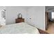 Relaxing bedroom features hardwood floors, ensuite bath, and neutral paint palette at 48 Aiken St, Charleston, SC 29403