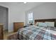 Bright bedroom features neutral walls, natural light, and wood flooring at 48 Aiken St, Charleston, SC 29403