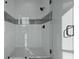 Contemporary shower with glass enclosure, black hardware, and gray and white tile at 48 Aiken St, Charleston, SC 29403