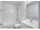 Bright bathroom with white fixtures, vanity and tub-shower combo at 4818 Buttercup Way, Summerville, SC 29485