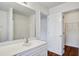Bathroom with white countertop, large mirror, and vinyl floors at 4818 Buttercup Way, Summerville, SC 29485