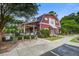 Community clubhouse with pool access, lush landscaping and concrete sidewalk at 4818 Buttercup Way, Summerville, SC 29485