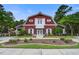 Community clubhouse features lush landscaping, sidewalk, and well-manicured lawn at 4818 Buttercup Way, Summerville, SC 29485