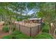 Community playground featuring modern equipment and tree lined perimeter at 4818 Buttercup Way, Summerville, SC 29485