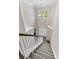 Grand entryway with soaring ceilings, a view of the front door, and a staircase with carpet at 5257 Mulholland Dr, Summerville, SC 29485