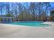 Well-maintained community pool with clear water and spacious deck, perfect for summertime fun at 5257 Mulholland Dr, Summerville, SC 29485