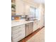 Bright kitchen featuring white cabinetry, stainless steel appliances, and ample counter space at 529 Laurel Ridge Rd, North Charleston, SC 29418
