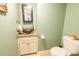 Stylish powder room with a decorative sink, granite countertop, and updated fixtures at 529 Laurel Ridge Rd, North Charleston, SC 29418