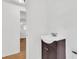 Bathroom featuring dark wood vanity and an open doorway at 5375 Highway 174, Adams Run, SC 29426