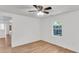 Bedroom featuring natural light and wood floors with a ceiling fan at 5375 Highway 174, Adams Run, SC 29426