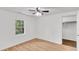 Bedroom featuring natural light, wood floors and a walk-in closet at 5375 Highway 174, Adams Run, SC 29426