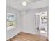 Bright bedroom featuring natural light and wood floors with ceiling fan at 5375 Highway 174, Adams Run, SC 29426