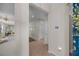 Bright entryway with tile flooring, neutral walls, and a view of the kitchen at 546 Sea Foam St, Summerville, SC 29486