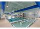 Bright indoor community pool featuring an accessible ramp and blue accents at 546 Sea Foam St, Summerville, SC 29486