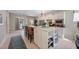 Bright, spacious kitchen featuring white cabinetry, stainless appliances, and a large center island at 546 Sea Foam St, Summerville, SC 29486