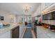 Gourmet kitchen features stainless appliances, granite countertops, and white cabinets at 546 Sea Foam St, Summerville, SC 29486