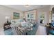 Cozy living room with neutral walls, lots of light, stylish furniture, and elegant decor at 546 Sea Foam St, Summerville, SC 29486