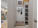 Cozy mudroom bench with storage shelves and convenient hanging hooks at 546 Sea Foam St, Summerville, SC 29486