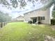 Spacious backyard featuring a patio, outdoor seating, and a well-maintained lawn for outdoor enjoyment at 610 Knowledge Dr, Ladson, SC 29456