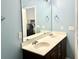 Bathroom features a double sink vanity, stylish mirrors, and contemporary fixtures offering functional elegance at 610 Knowledge Dr, Ladson, SC 29456