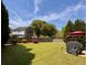 Spacious backyard with a large lawn, privacy fence and patio area perfect for outdoor entertaining and relaxation at 7 Lavington Rd, Charleston, SC 29407