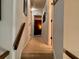 An upward view of a carpeted hallway leading to various rooms at 7 Lavington Rd, Charleston, SC 29407