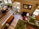 An eye-level shot of an open-concept living room with wood floors at 7 Lavington Rd, Charleston, SC 29407