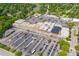 Aerial view showcases the nearby shopping center with easy access for local residents at 7 Wesley Dr, Charleston, SC 29407