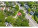 Aerial view featuring the red roof home surrounded by lush greenery at 7 Wesley Dr, Charleston, SC 29407