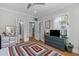 This bedroom features an ensuite bathroom, walk in closet, and beautiful hardwood floors at 7 Wesley Dr, Charleston, SC 29407