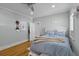 This bedroom is bright and spacious, offering hardwood floors at 7 Wesley Dr, Charleston, SC 29407
