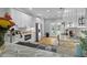 Bright kitchen featuring granite countertops, white cabinets, and stainless steel appliances at 7 Wesley Dr, Charleston, SC 29407