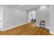 Spacious living room with hardwood floors and an open doorway to a cozy sitting room at 7 Wesley Dr, Charleston, SC 29407