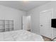 Spacious bedroom with hardwood floors, modern white decor, shelving and a comfortable layout at 727 Hodge Rd, Summerville, SC 29483