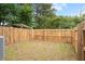 This fenced backyard features a grass area at 7813 Sandida Ct, North Charleston, SC 29418