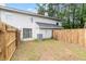 This home features a fenced backyard and green space at 7813 Sandida Ct, North Charleston, SC 29418