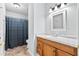 Bathroom with shower and vanity with granite countertop at 7813 Sandida Ct, North Charleston, SC 29418